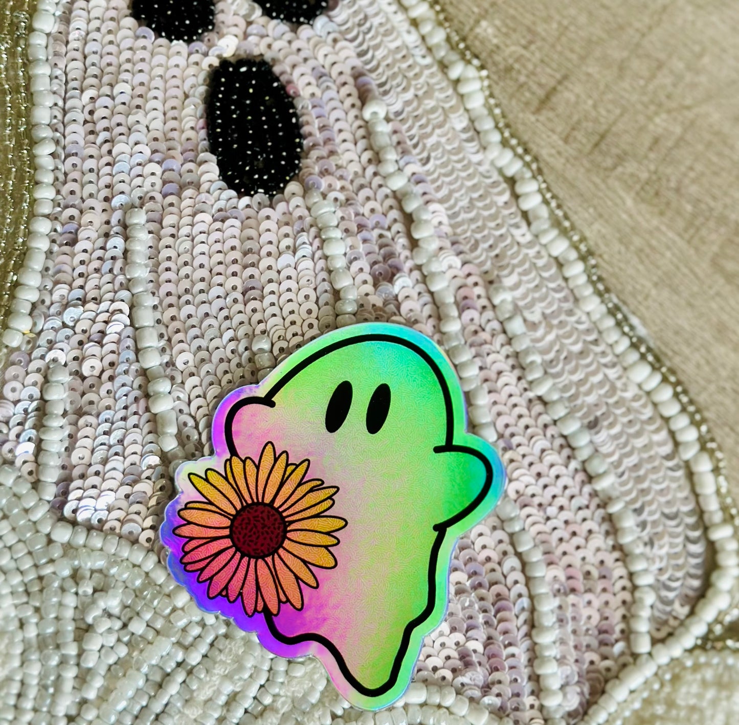 Holographic Ghost Sticker