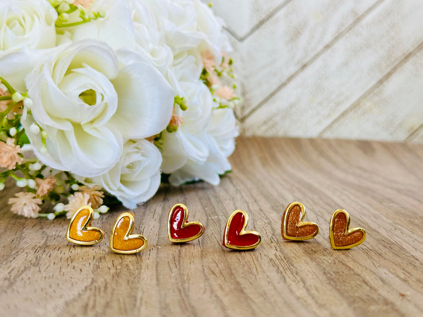 Gold Rimmed Heart Studs