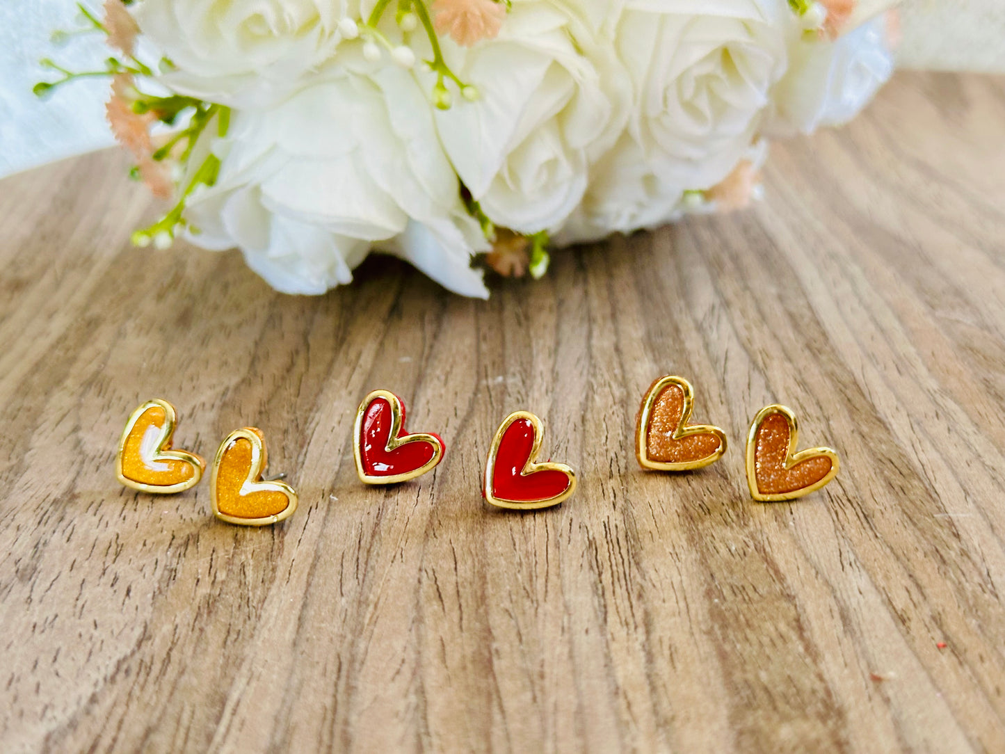 Gold Rimmed Heart Studs
