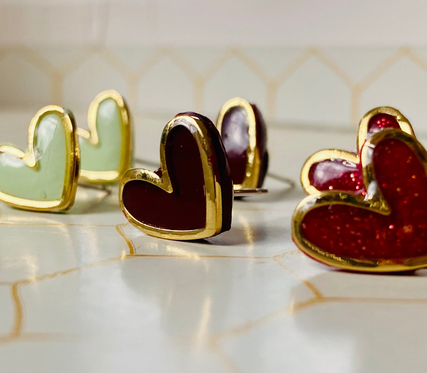 Gold Rimmed Heart Studs