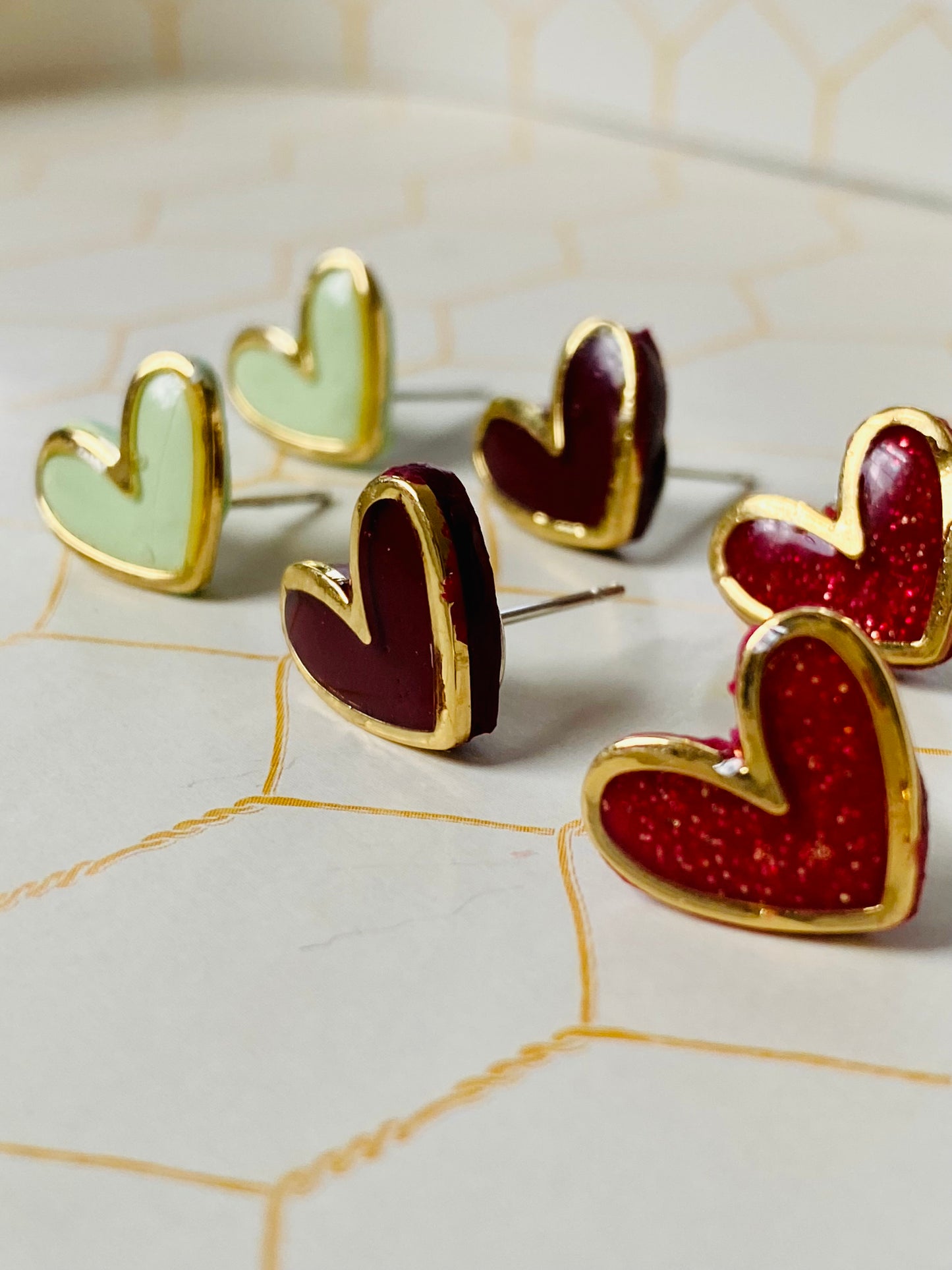 Gold Rimmed Heart Studs